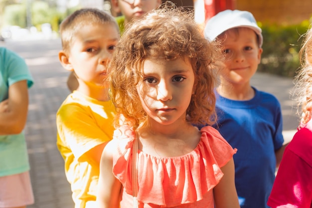 Portrait of sad girl at summer camp