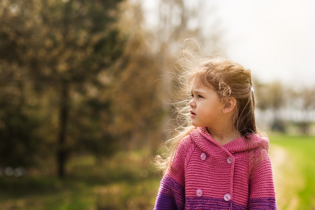 Photo portrait of a sad little girl