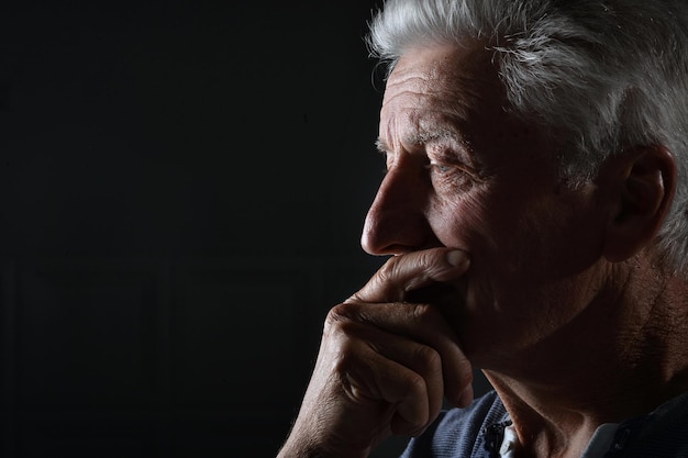portrait of sad thinking senior man