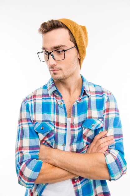 Portrait of a sad young hipster on the white background