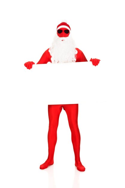 Photo portrait of santa claus holding blank placard against white background