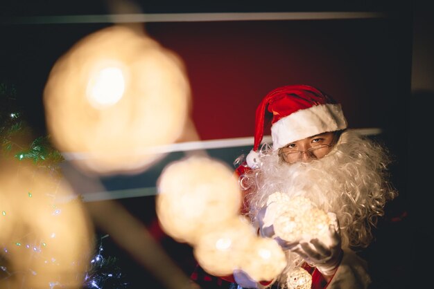 Portrait of santa clause decorate christmas tree in the houseThailand peopleXmas festival