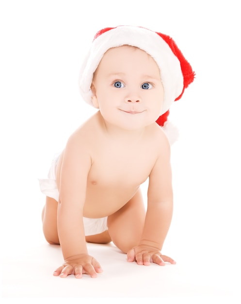 portrait of santa helper baby over white wall