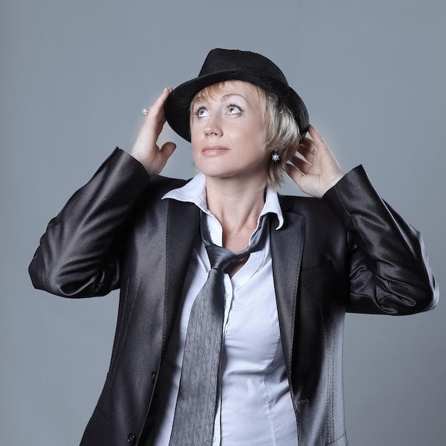 Portrait of a scandalous woman in a black hat