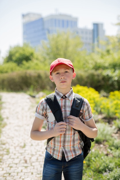 Portrait of a schoolboy in nature