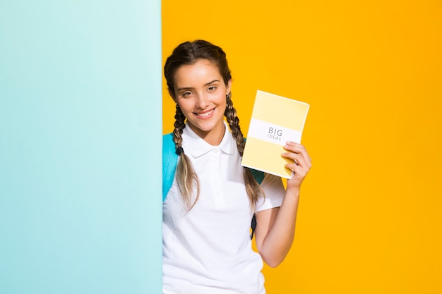 Photo portrait of a schoolgirl with copyspace