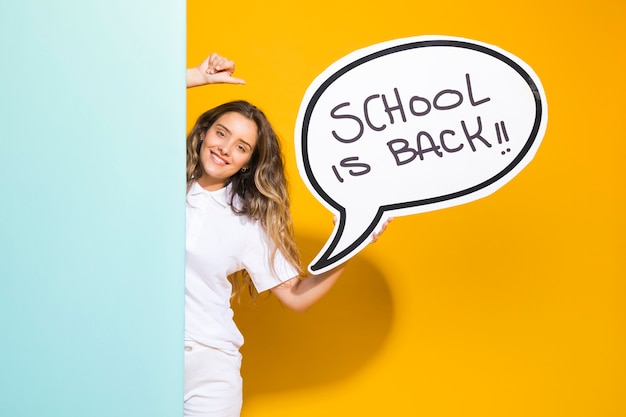 Portrait of a schoolgirl with speech bubble