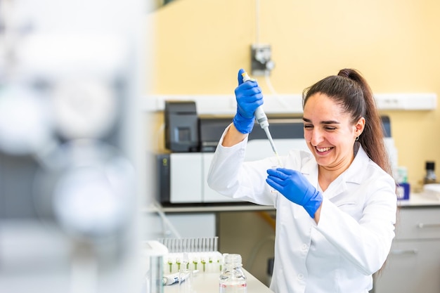 Portrait of scientist examining chemical in laboratory