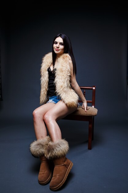 Portrait of a seductive lady in fur coat