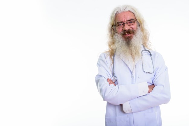 portrait of a senior bearded man doctor wearing eyeglasses