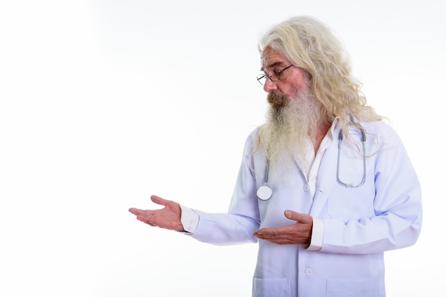 portrait of a senior bearded man doctor wearing eyeglasses