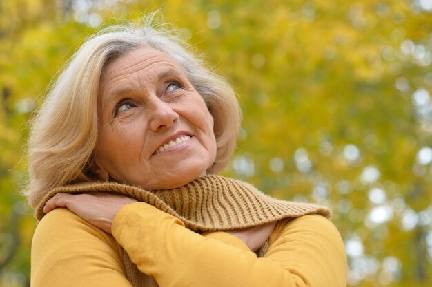 Portrait of a senior beautiful woman posing outdoors