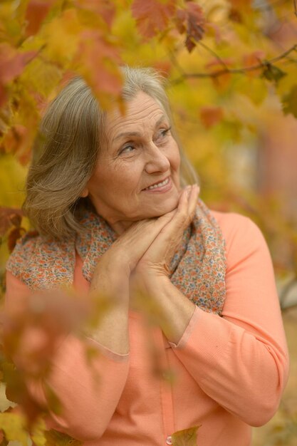 Portrait of senior beautiful woman posing outdoors