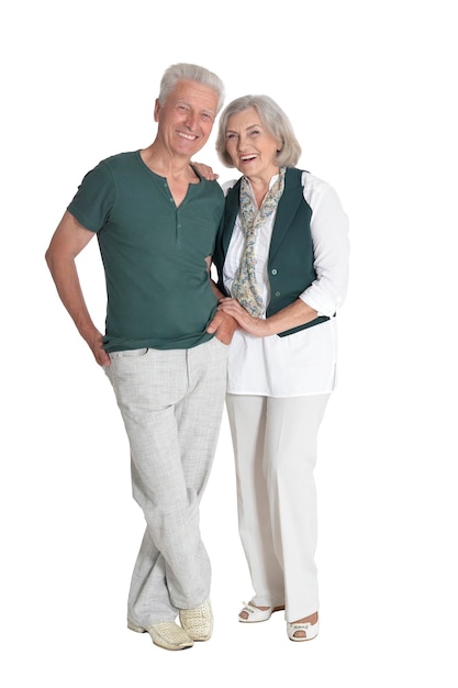 Portrait of senior couple hugging isolated