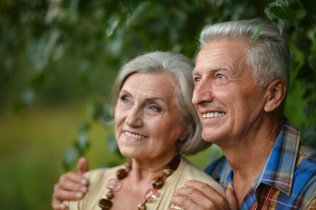 Portrait of a senior couple in love posing outdoors