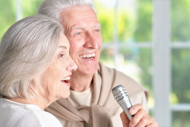 Portrait of a senior couple and microphone