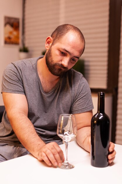 Portrait of senior man sitting at home