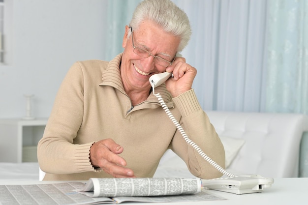 Portrait of senior man talking on the phone