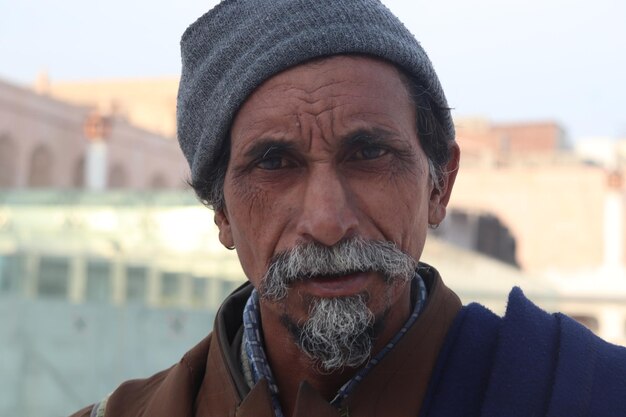 Portrait of senior man wearing knit hat