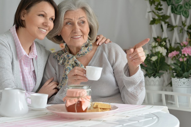 Portrait of a senior mother and adult daughter together