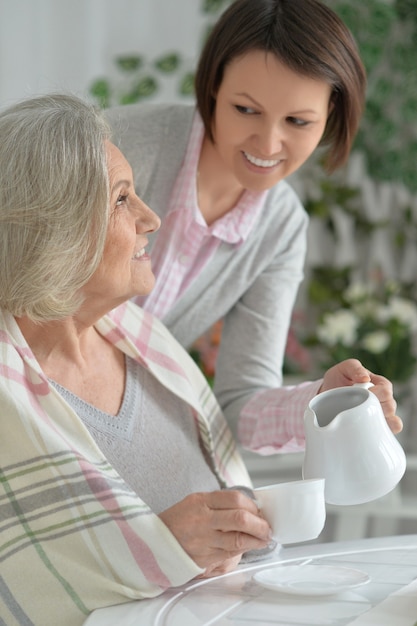 Portrait of a senior mother and adult daughter together