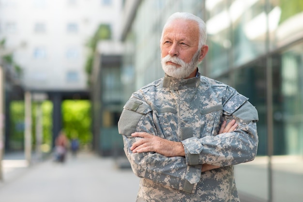 Portrait senior soldier in military uniform outdoor