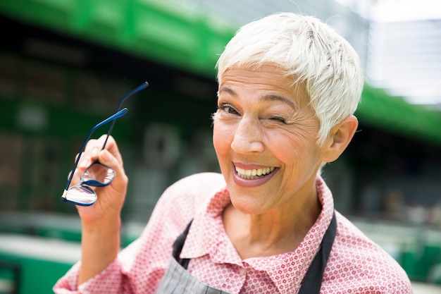 Portrait of an senior  woman who hints