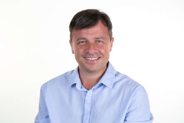 Portrait of a serious man wearing blue shirt