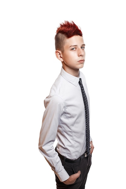 Portrait of serious teen with red mohawk wearing shirt and tie