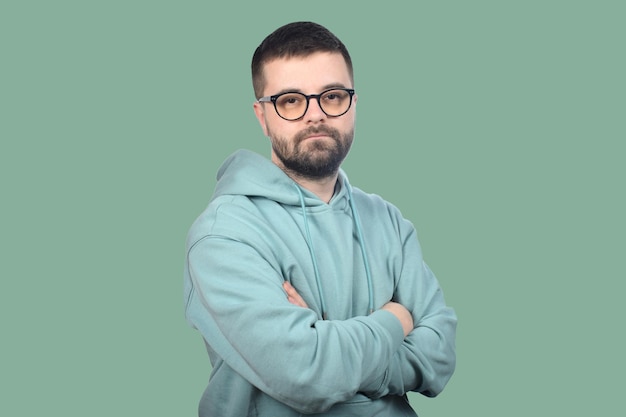 portrait of a serious young man in glasses