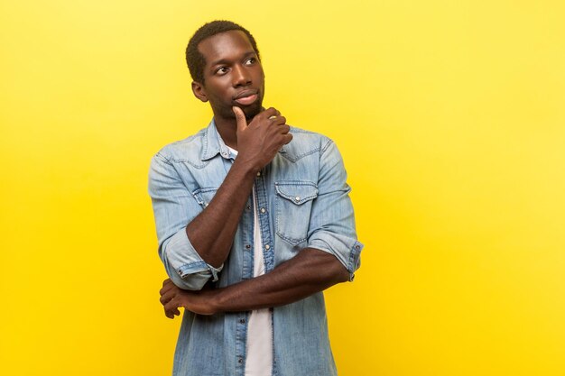 Portrait of a serious young man looking away