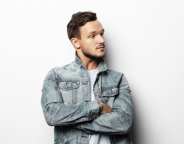 Portrait of sexy man over white background