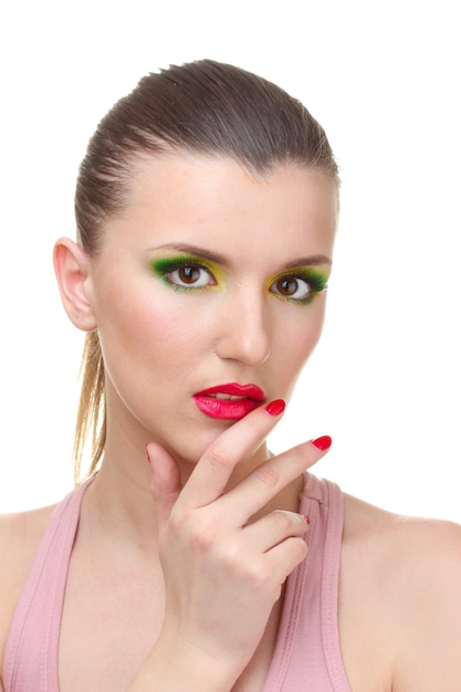 Portrait of sexy young woman with glamour make up and red manicure