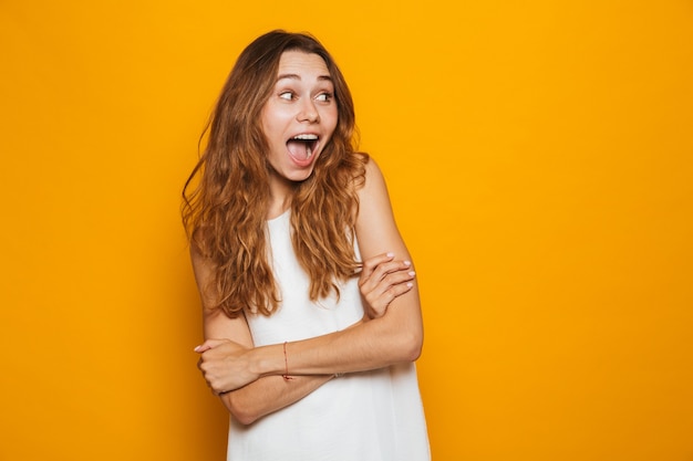 Portrait of a shocked young girl looking away