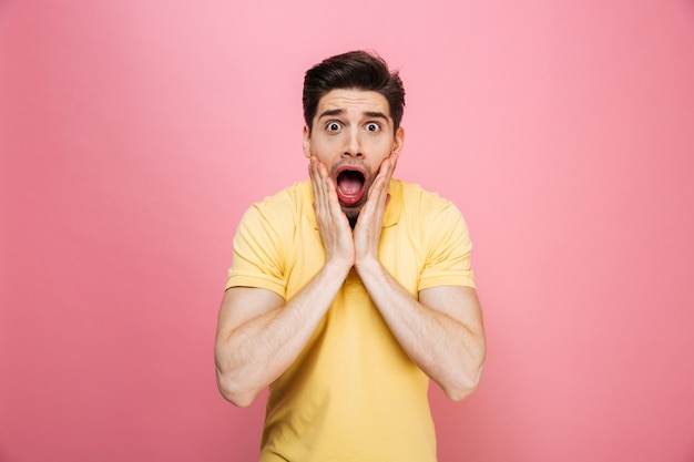 Portrait of a shocked young man