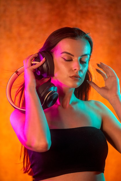 Portrait shot of a pretty young woman in rgb colors