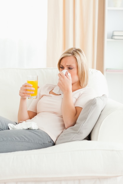 Portrait of a sick blond-haired woman