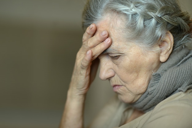 Photo portrait of a sick elderly woman ,closeup