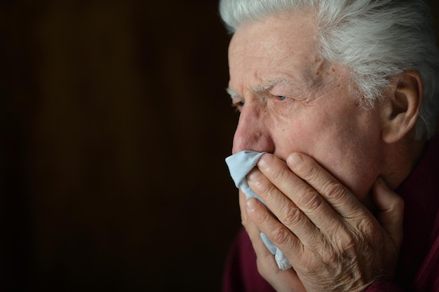 Portrait of sick senior man posing