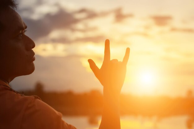 Portrait of silhouette man against sky during sunset