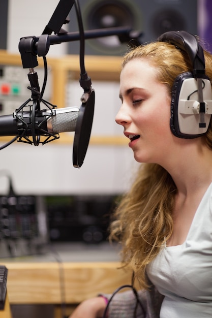 portrait of a singer recording a track