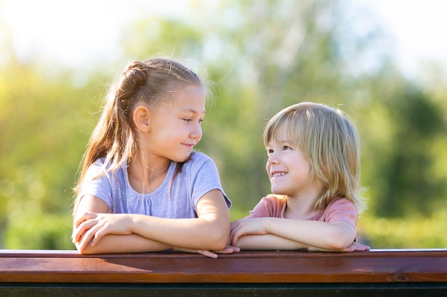 Portrait of a sister and brother of preschool age.