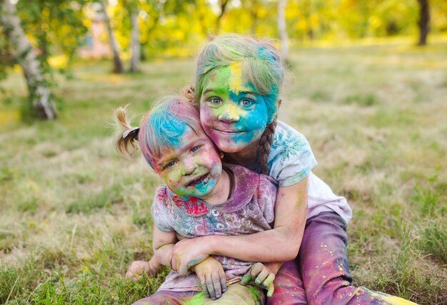 Portrait of the sisters, painted in the colors of Holi