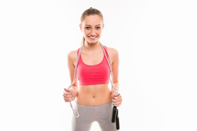 Portrait of slim young girl with skipping-rope