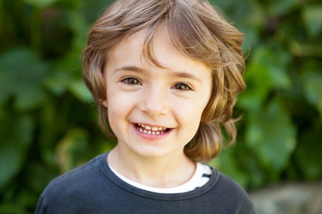 Portrait of a small child in the field 