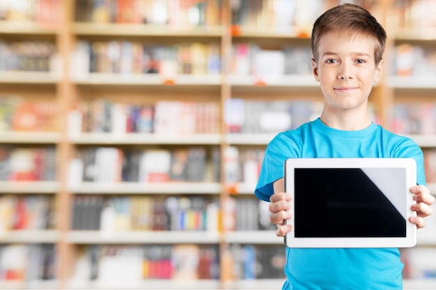 Portrait of smart schoolkids standing in line and looking at camera