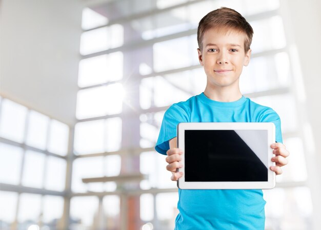 Portrait of smart schoolkids standing in line and looking at camera