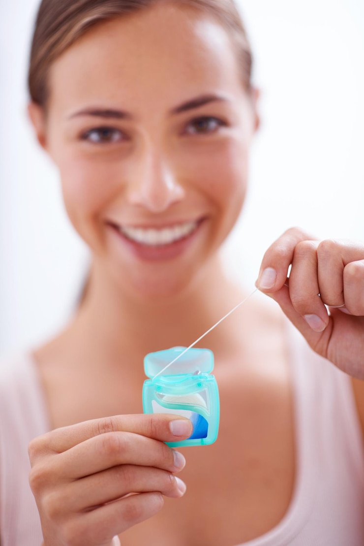 Photo portrait smile and dental floss for oral hygiene care with woman in bathroom of home for teeth whitening face product and happy young person in apartment to prevent tooth decay or gum disease