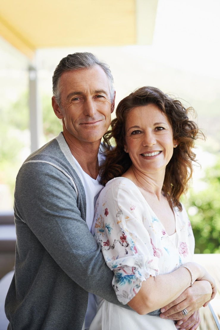 Photo portrait smile and mature couple hug in house patio for love connection or trust for partnership together face man and embrace woman for care commitment and relationship for support in home