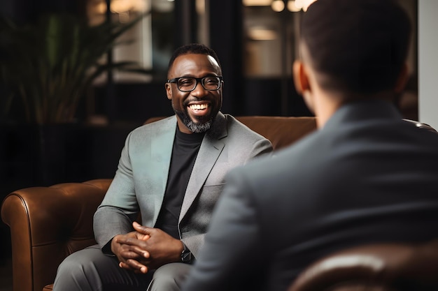 Portrait of a smiling African businessman in a meeting in a hotel hall